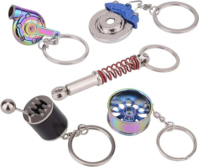 FEBRYTOLD 5 Pcs Car Parts Model Key Chains, Colorful Turbo Keychain, Black Manual Gearbox Keychain, Colorful Tire Rim Keychain, Blue Brake Rotor Keychain, Red Spring Shock-absorber Keychain